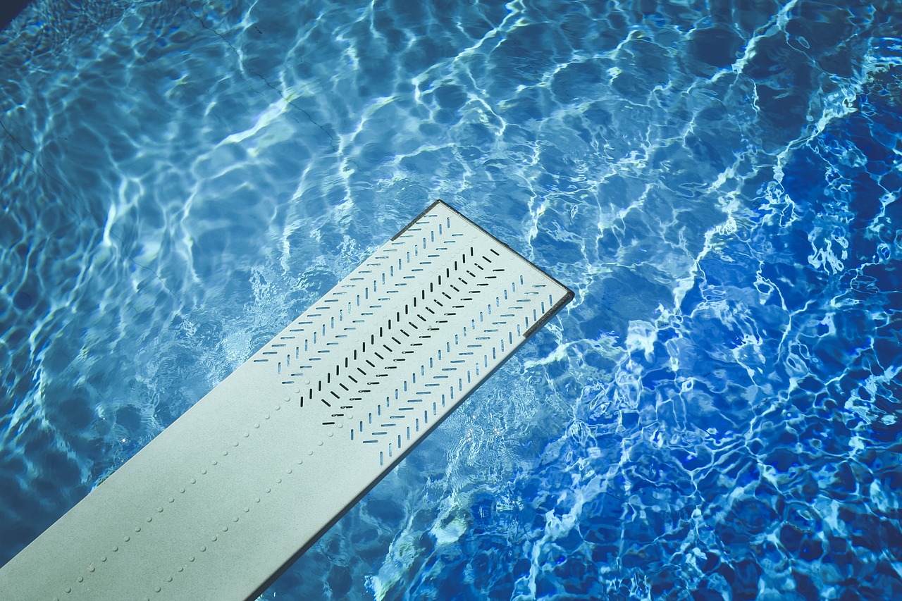 blue diving board pool free photo