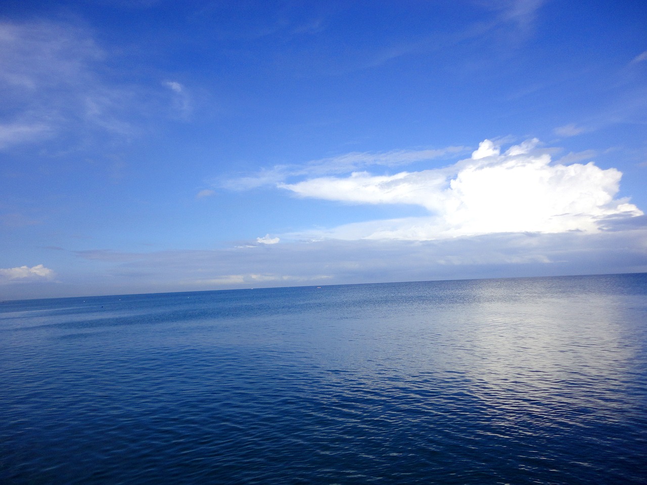 blue clouds deep ocean free photo