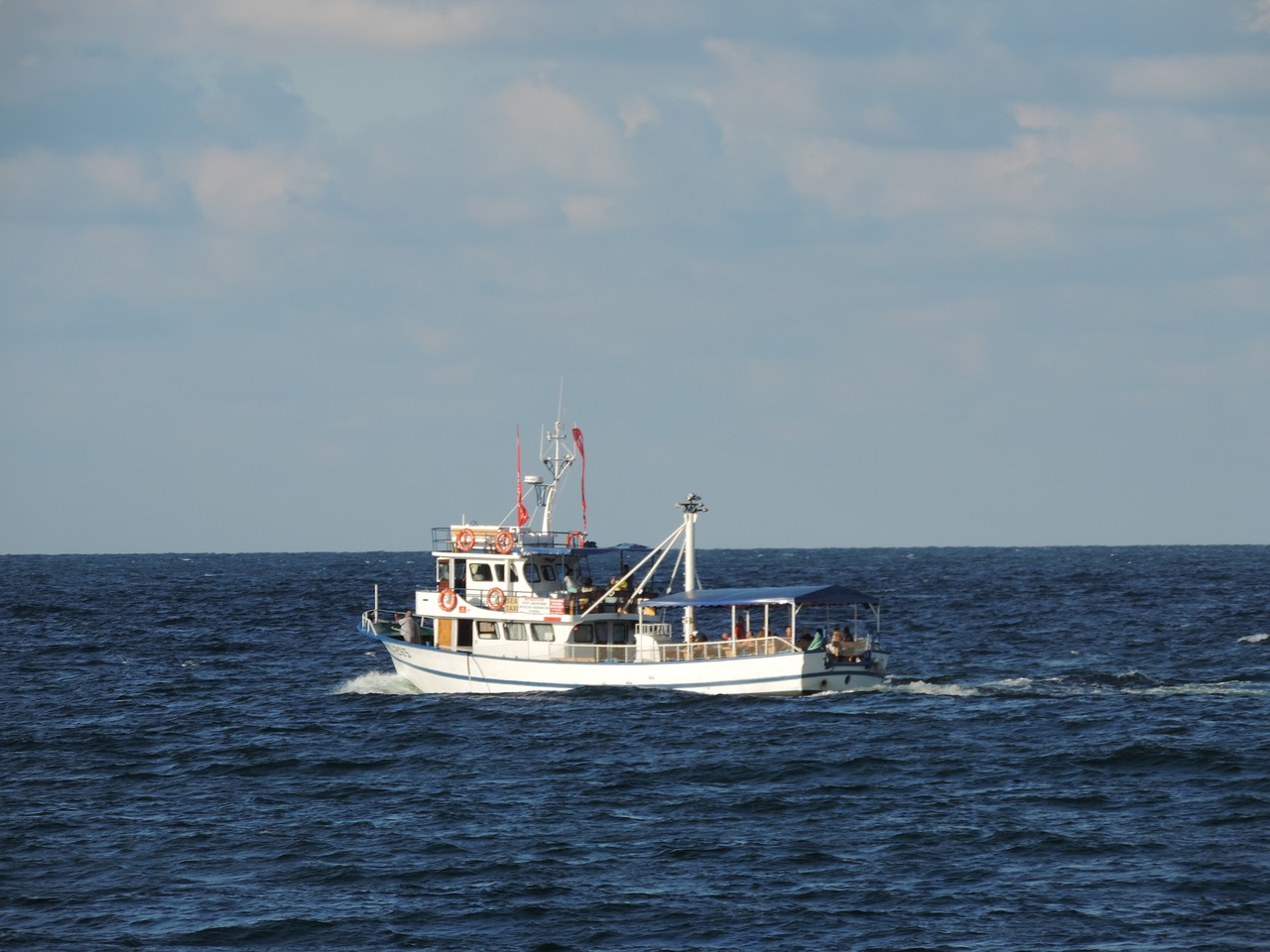 blue boat sea free photo