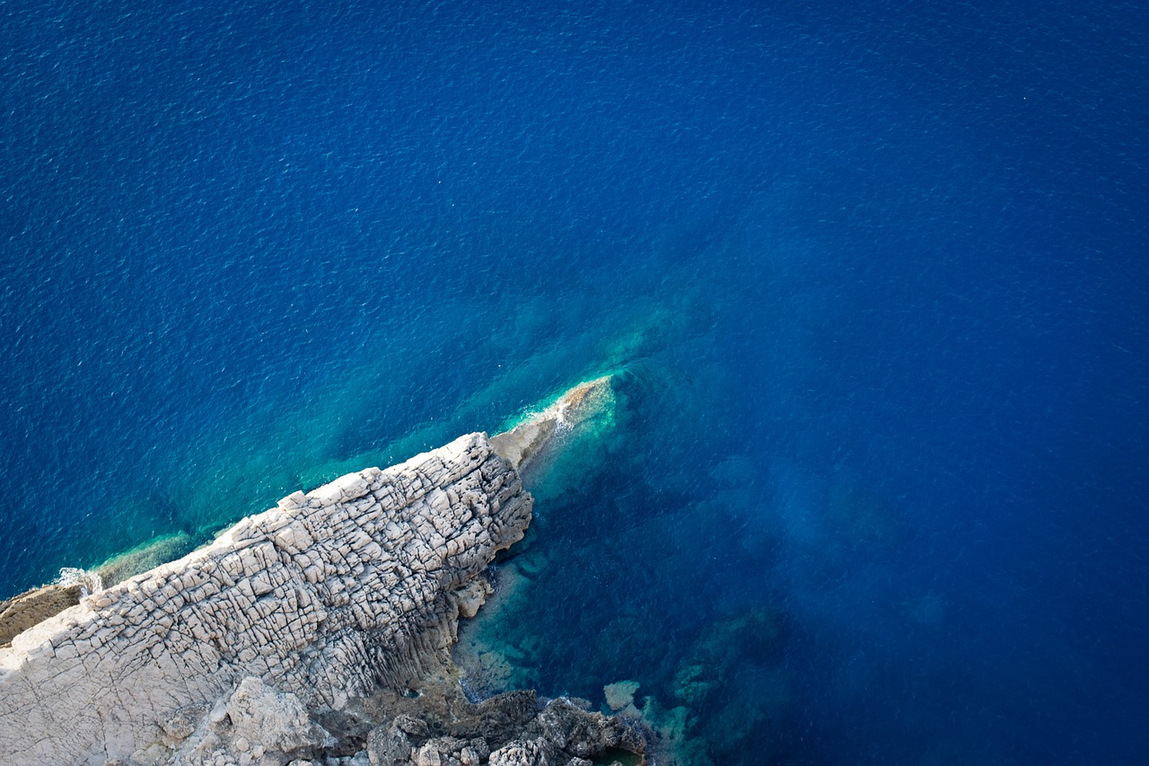 blue water rocks free photo