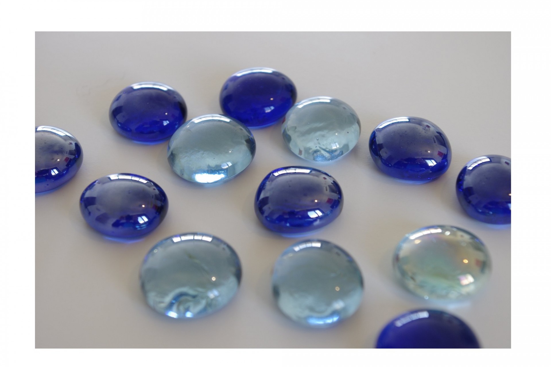 blue glass pebbles free photo