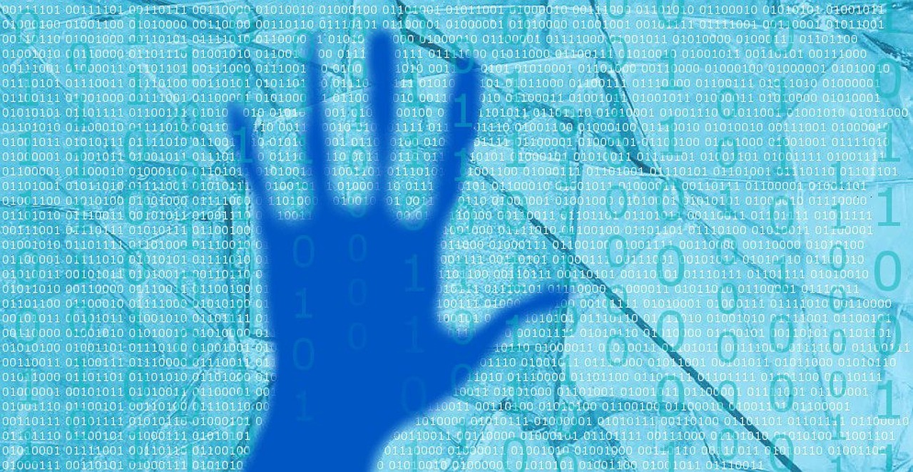 blue hand cyber attack numbers free photo
