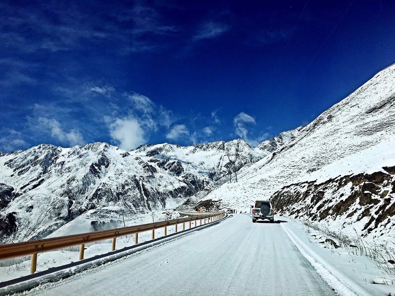 blue sky snow mountain road free photo