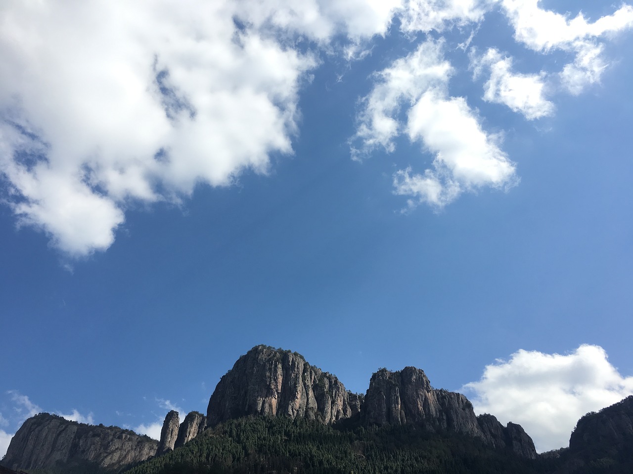 blue sky cliff white cloud free photo