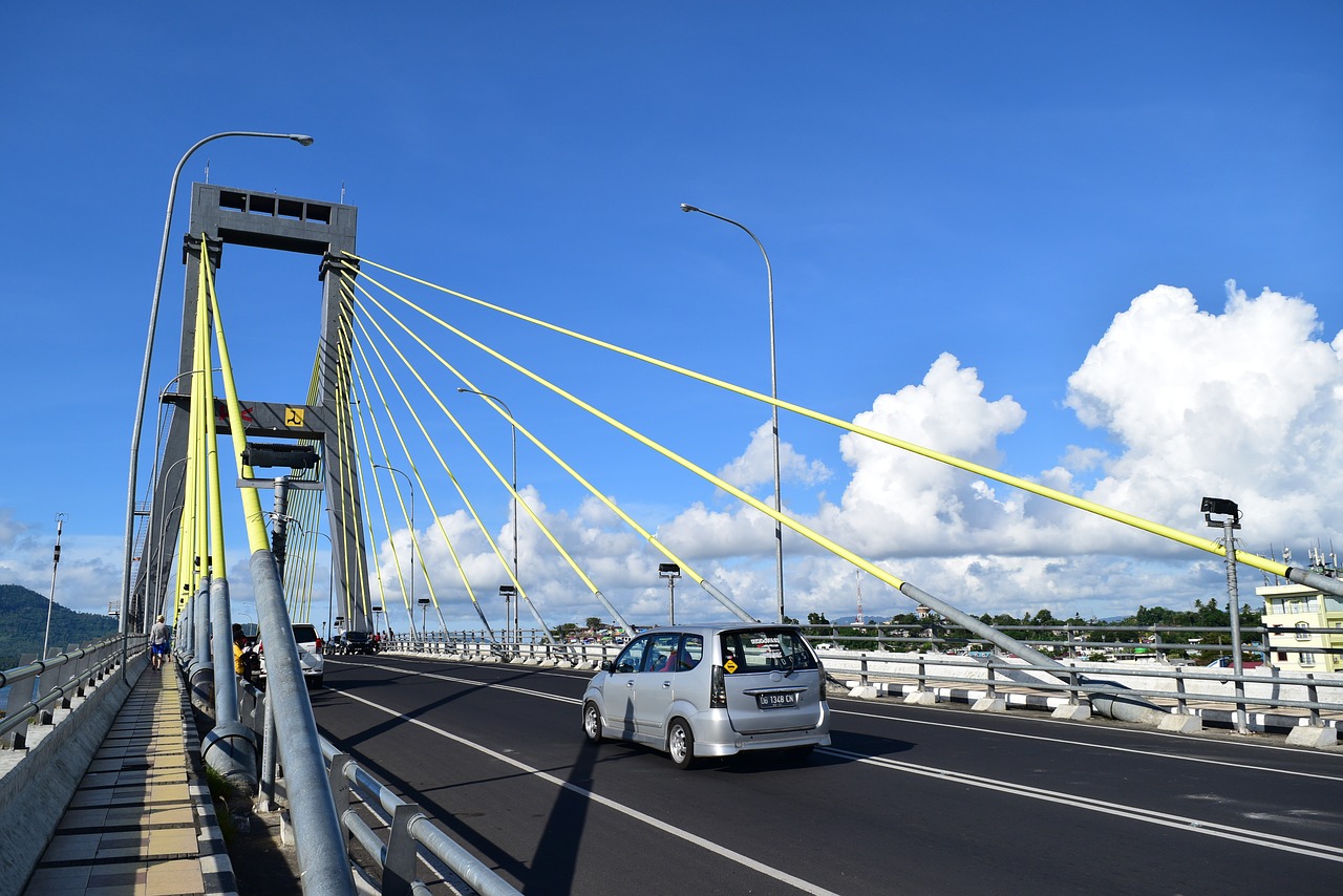 blue sky manado cable-stayed bridge free photo