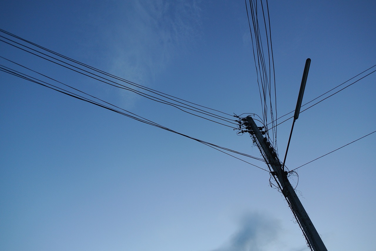 blue sky  electric pole  blue free photo