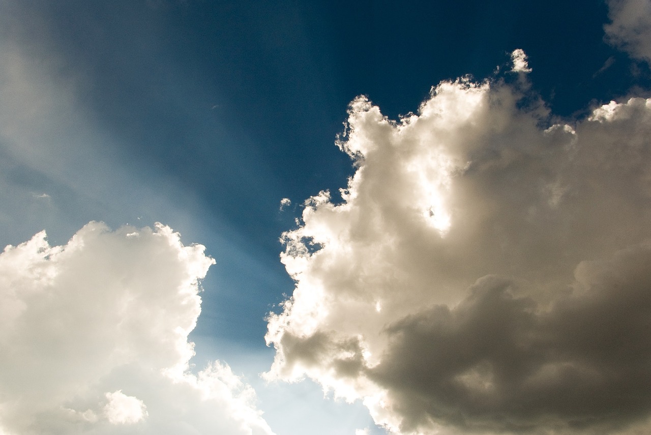 blue sky sun rays clouds free photo