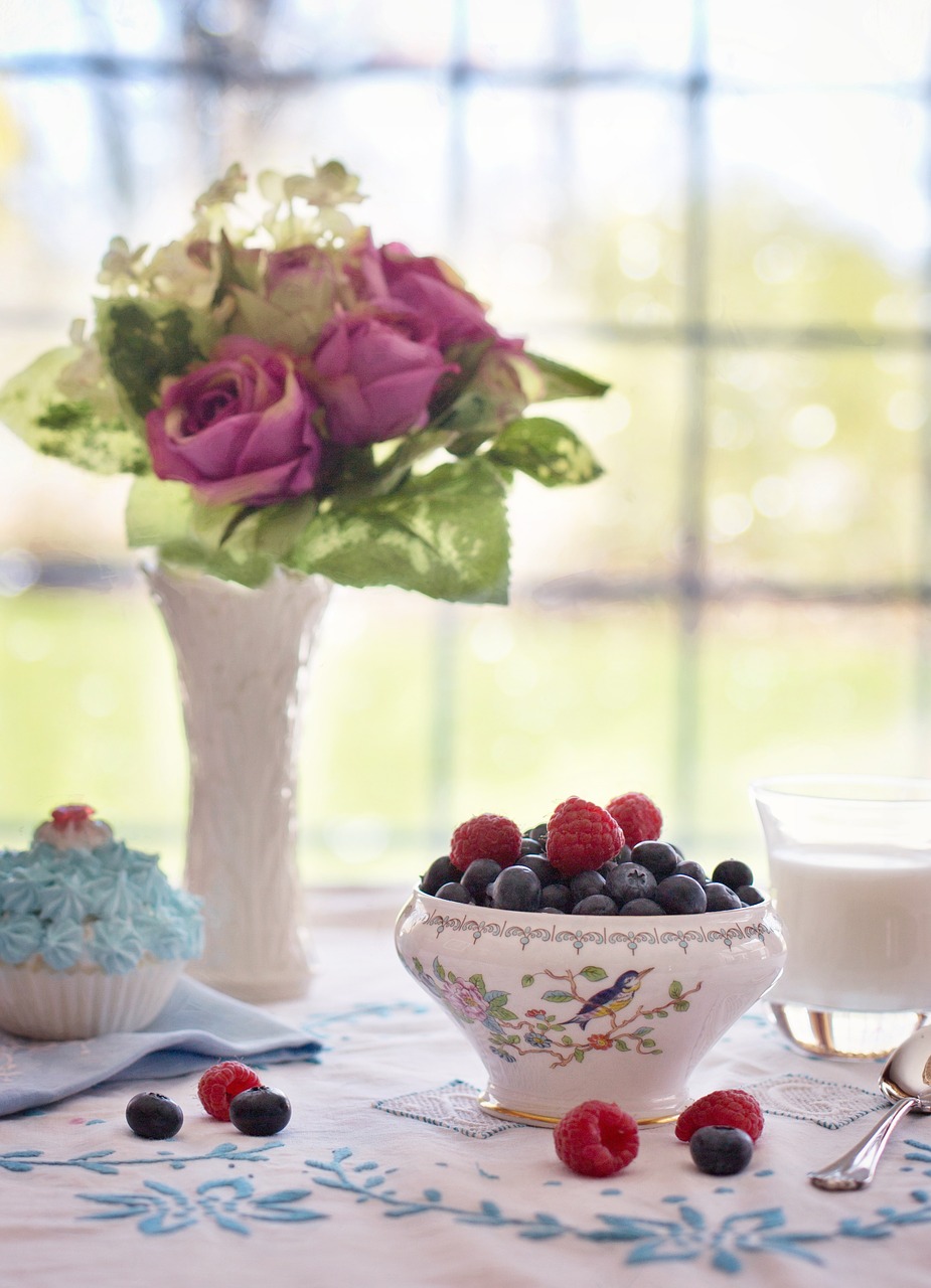 blueberries raspberries in bowl summer free photo