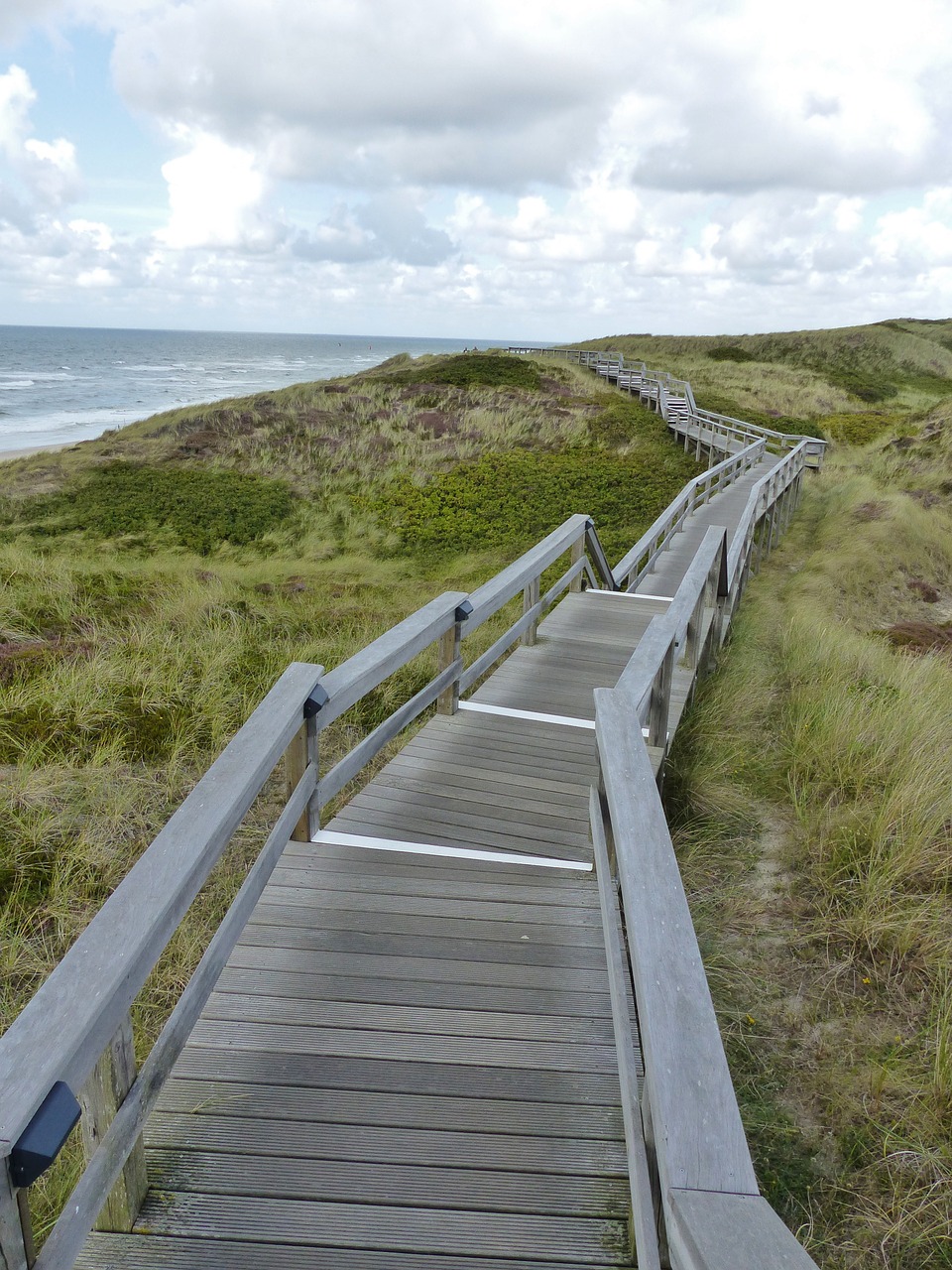 boardwalk sky clouds free photo