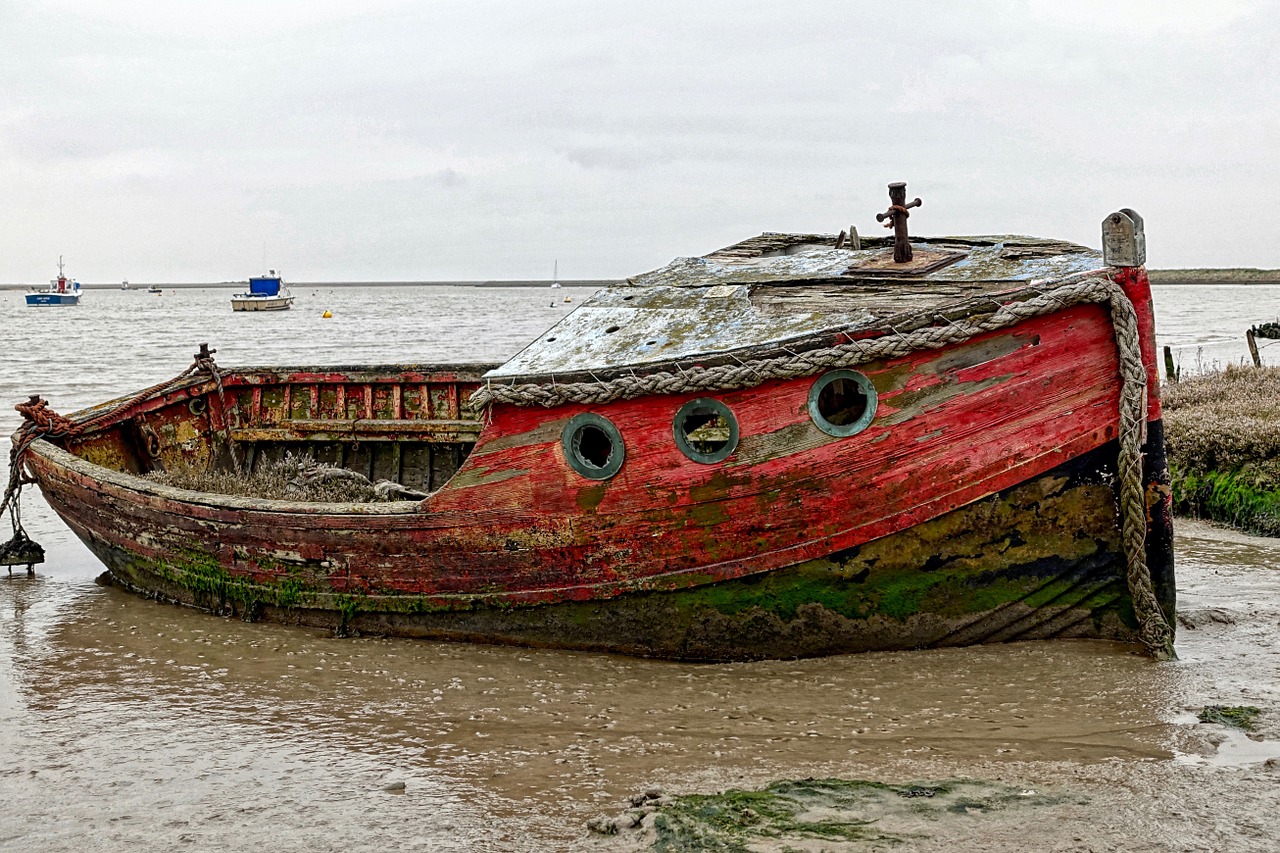 beached boat fishing free photo