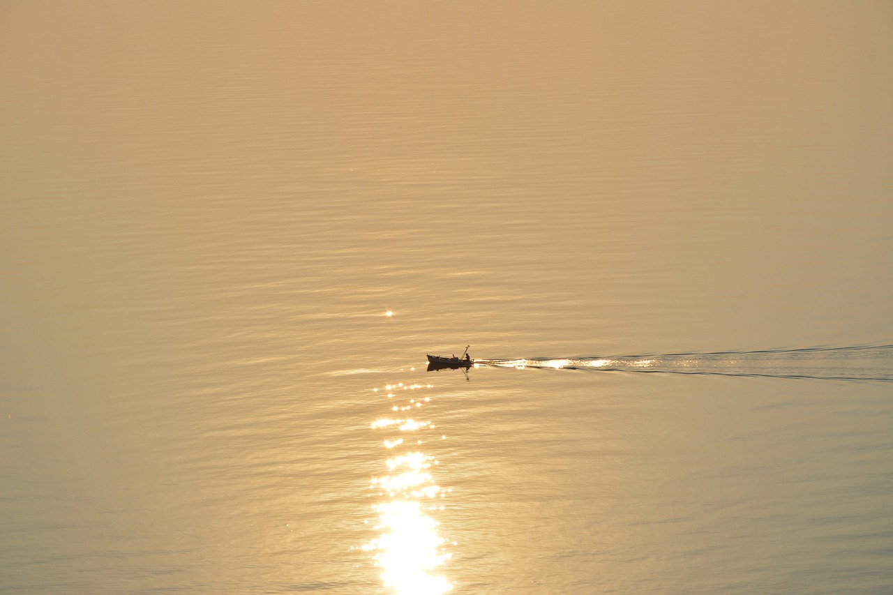 boat sunset sea free photo