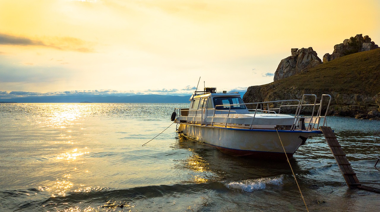 boat beach sunset free photo