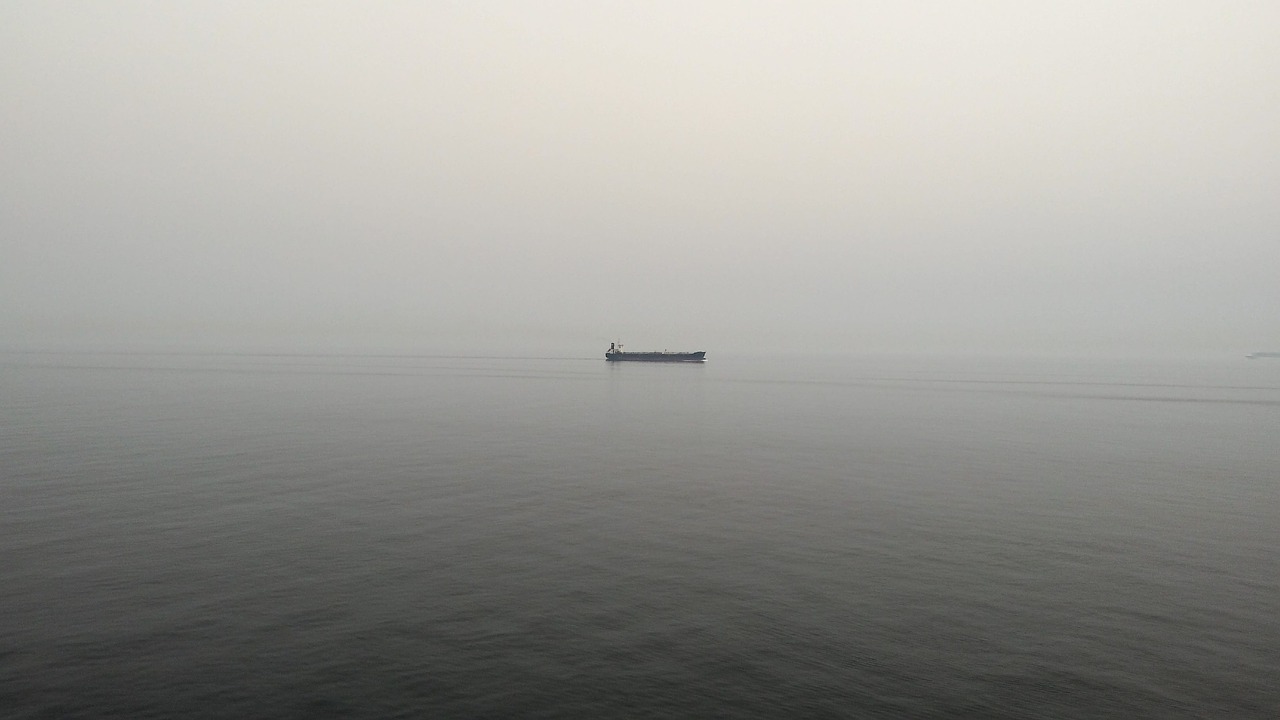 boat fisherman foggy free photo