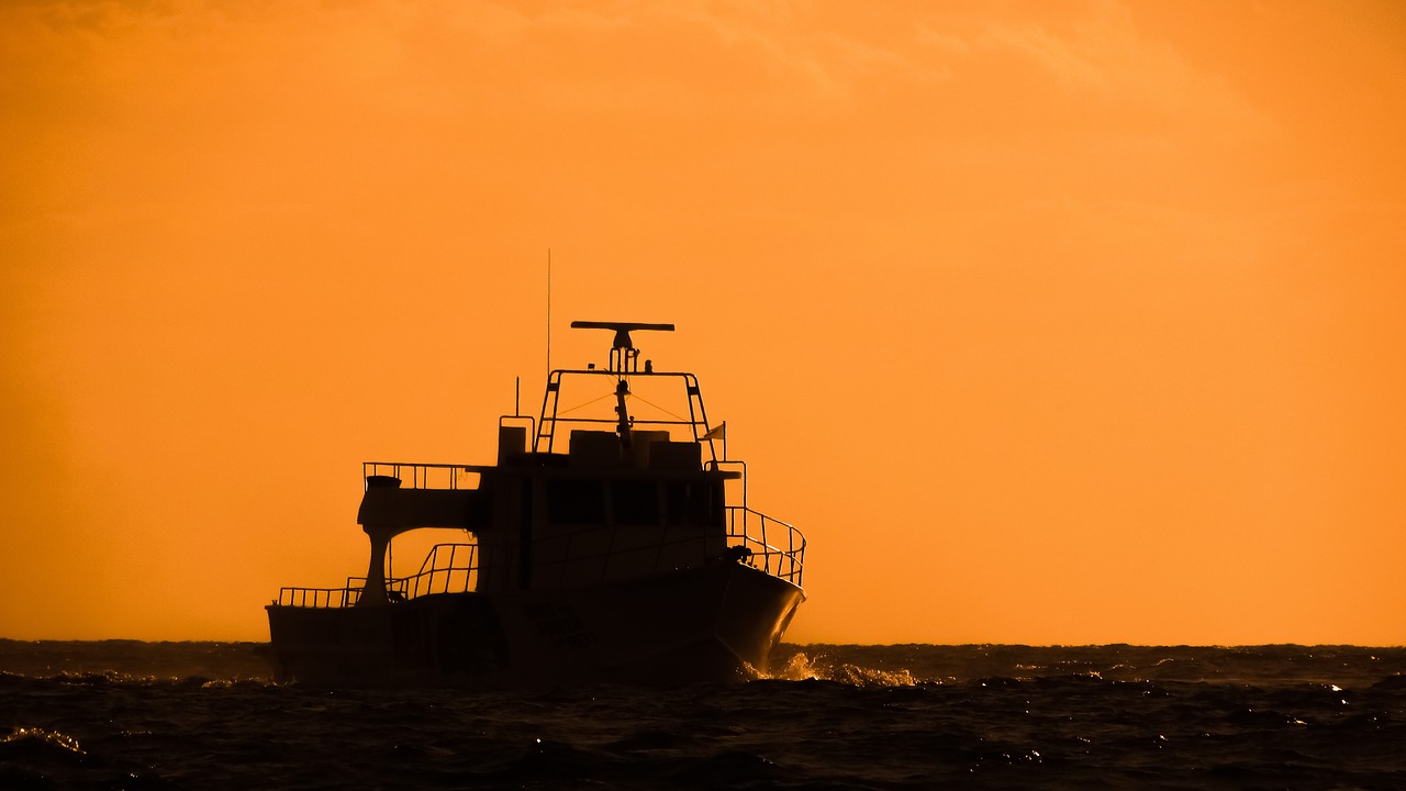 boat sunset sea free photo