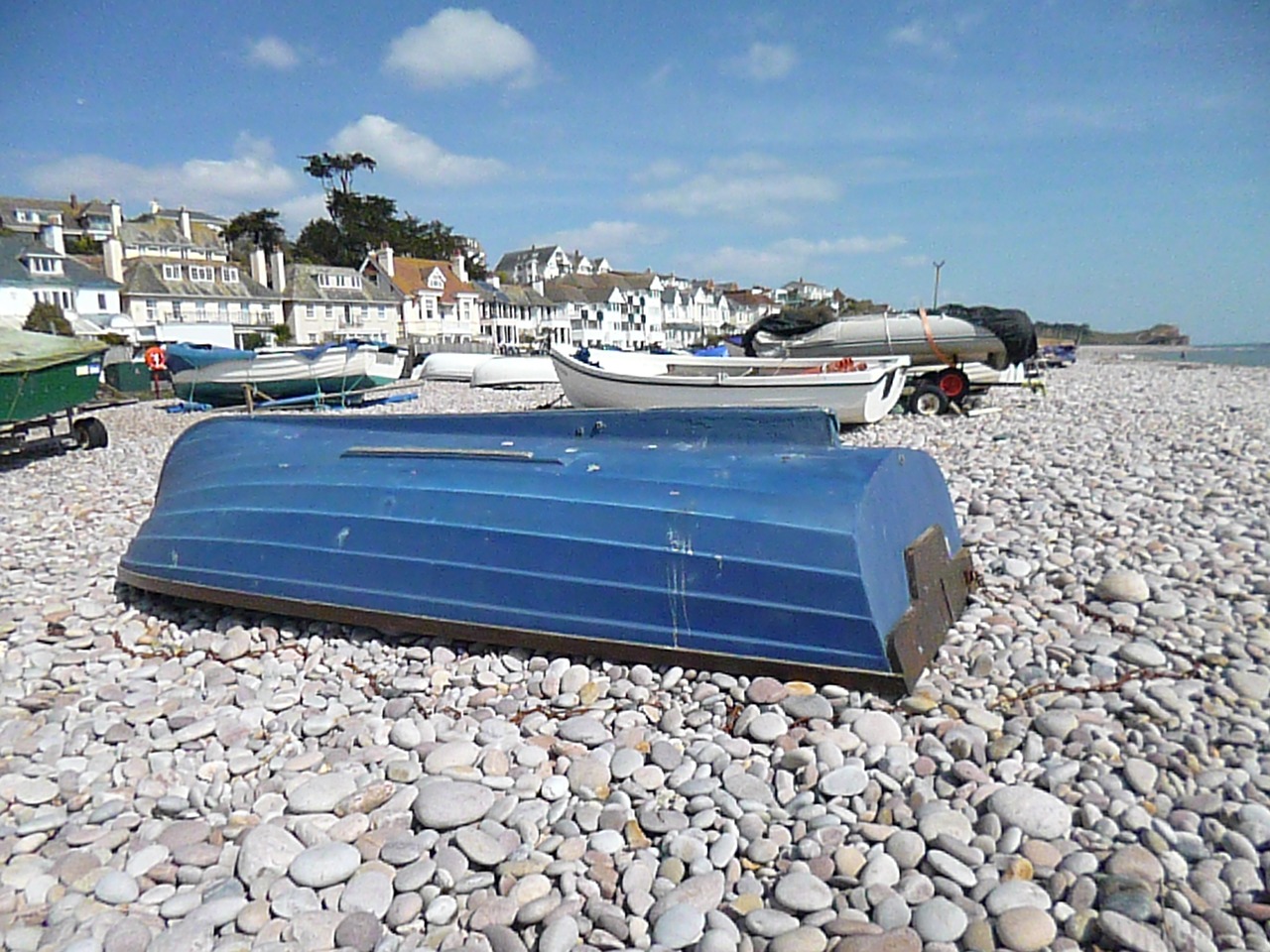 boat beach pebbles free photo