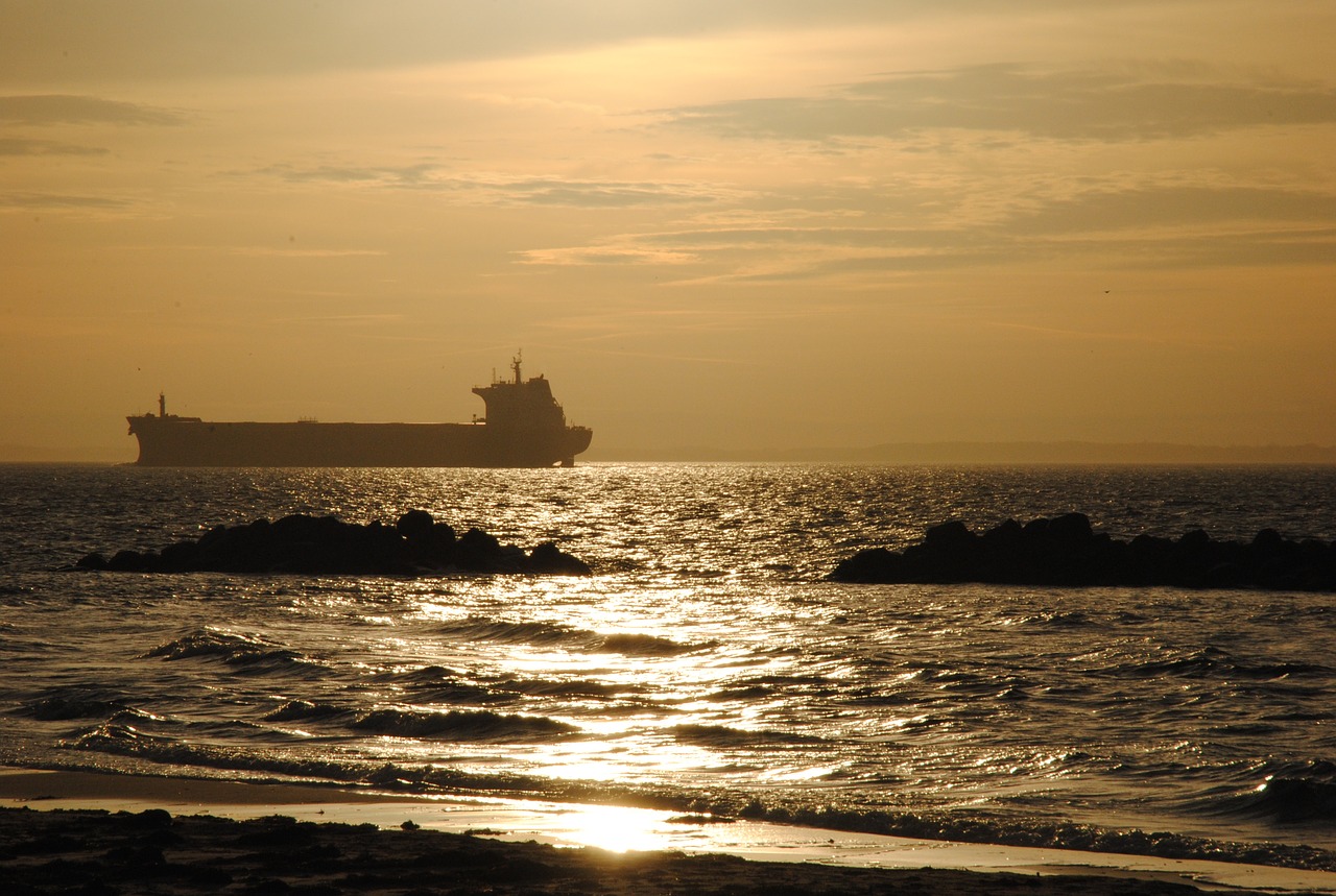 boat backlight coastal free photo