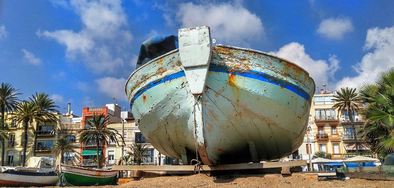 boat old wooden beach free photo