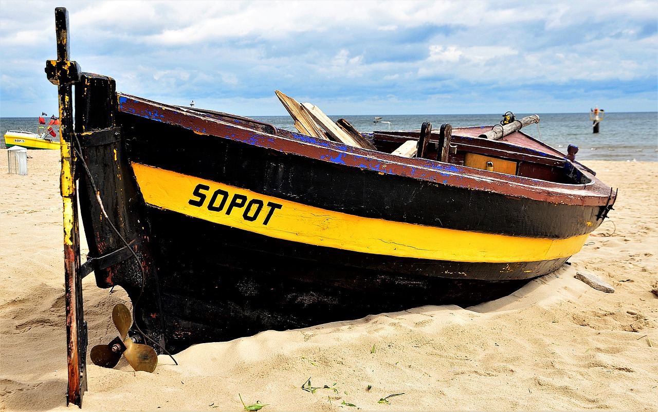 boat fishing beach free photo