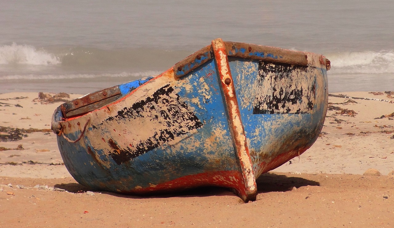 boat fishing vessel beach free photo