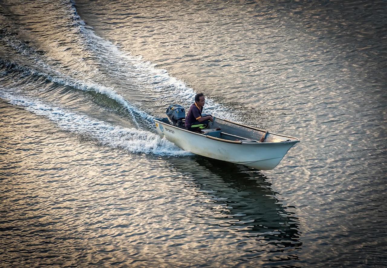 boat man water free photo