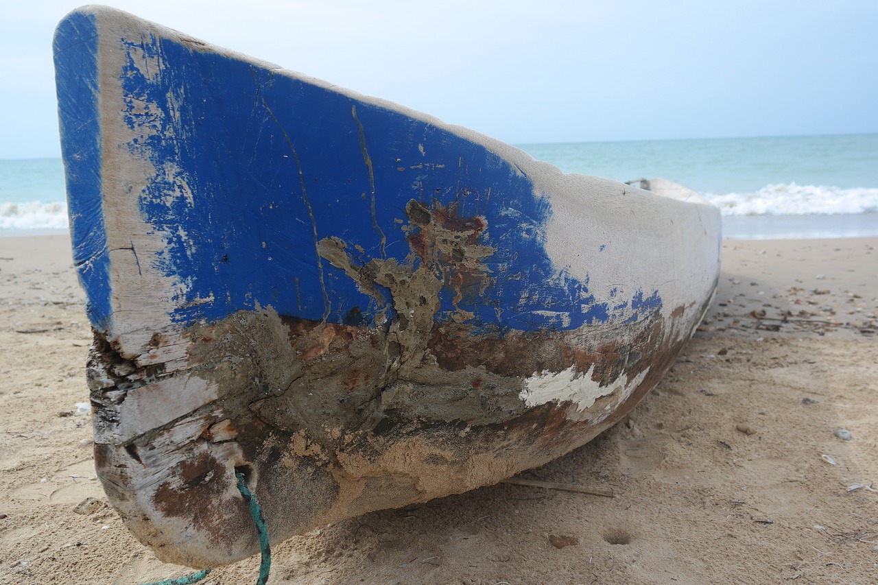 boat blue sea beach free photo