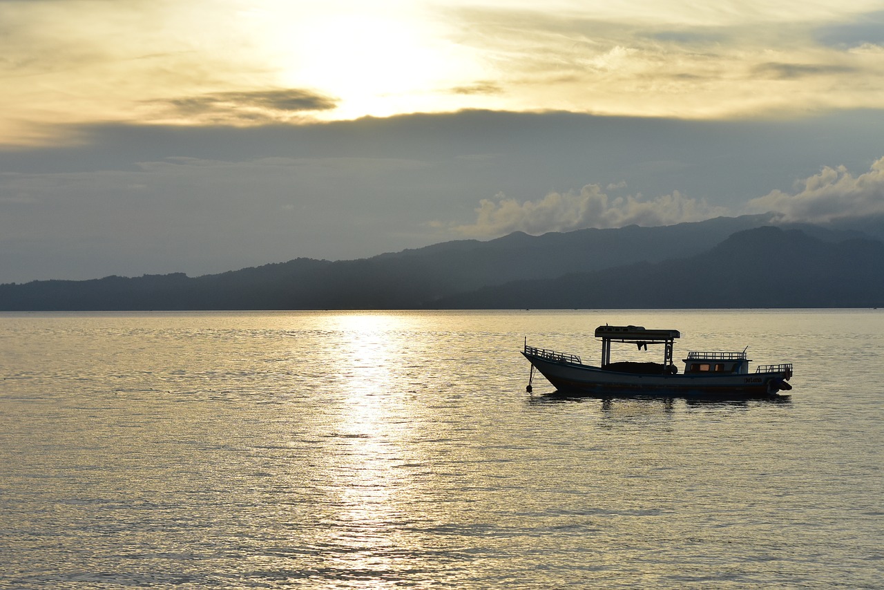 boat  water  sunset free photo