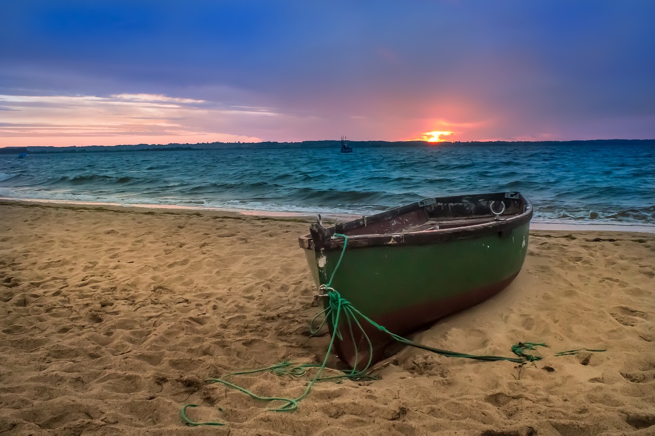 boat  sea  sunset free photo