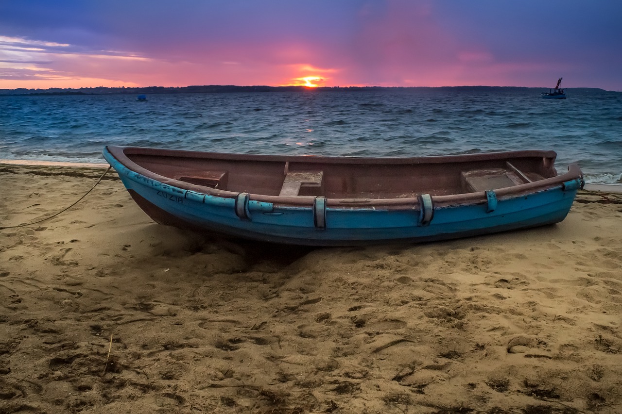 boat  sea  sunset free photo