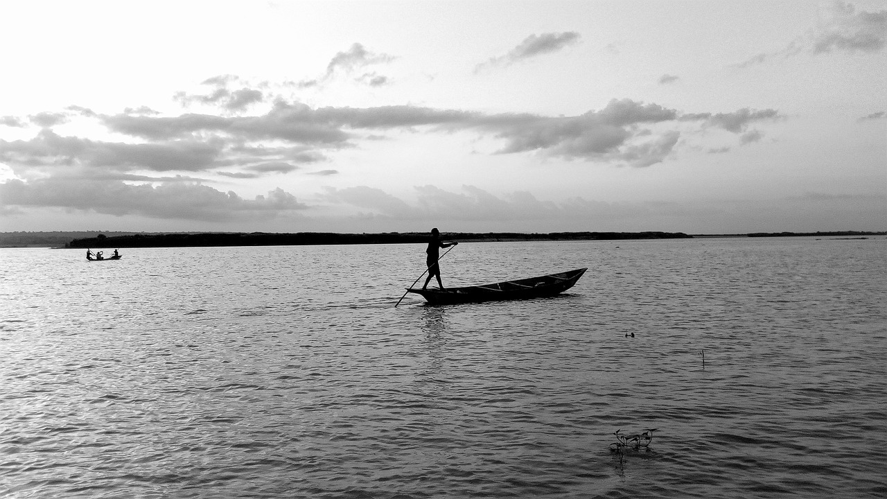 boat  paddling  clouds free photo