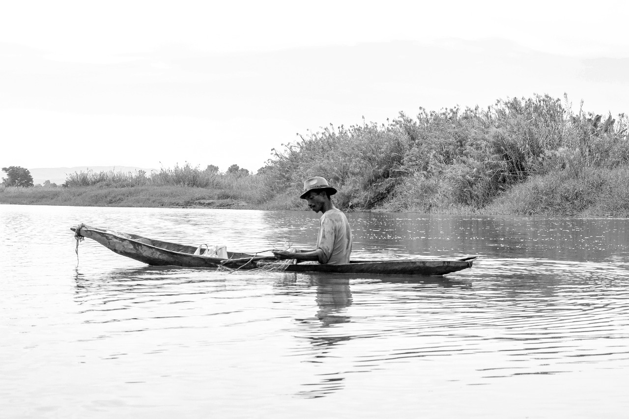 boat  canoe  fishermen free photo