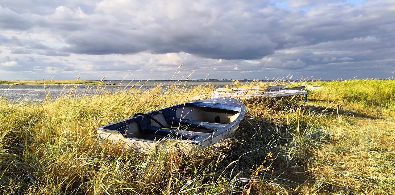 boat  clouds  beach free photo