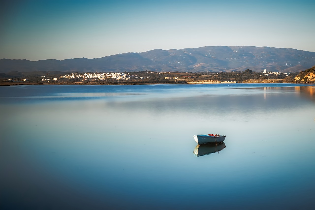 boat  coastline  sea free photo