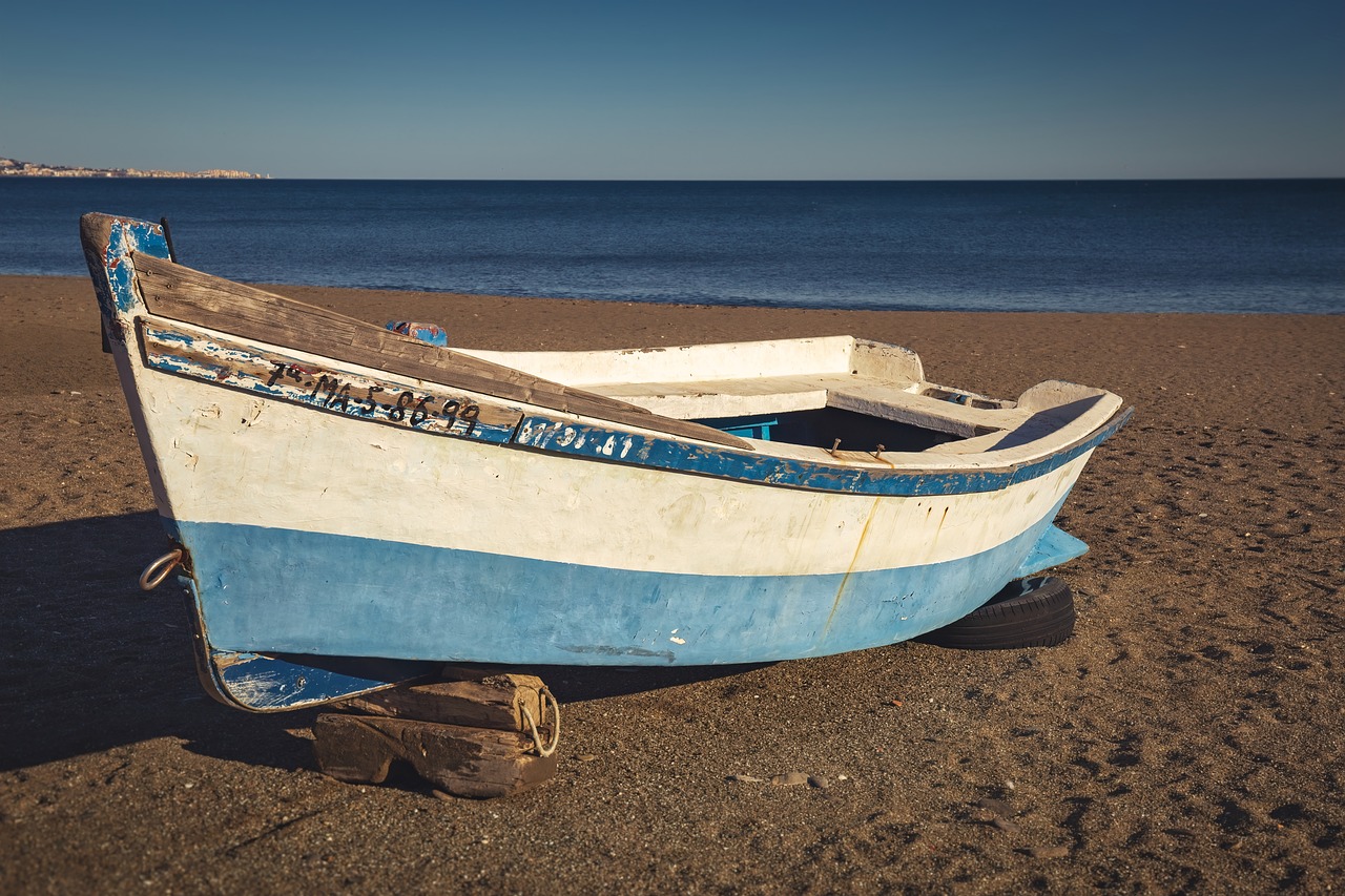 boat  fisher  beach free photo