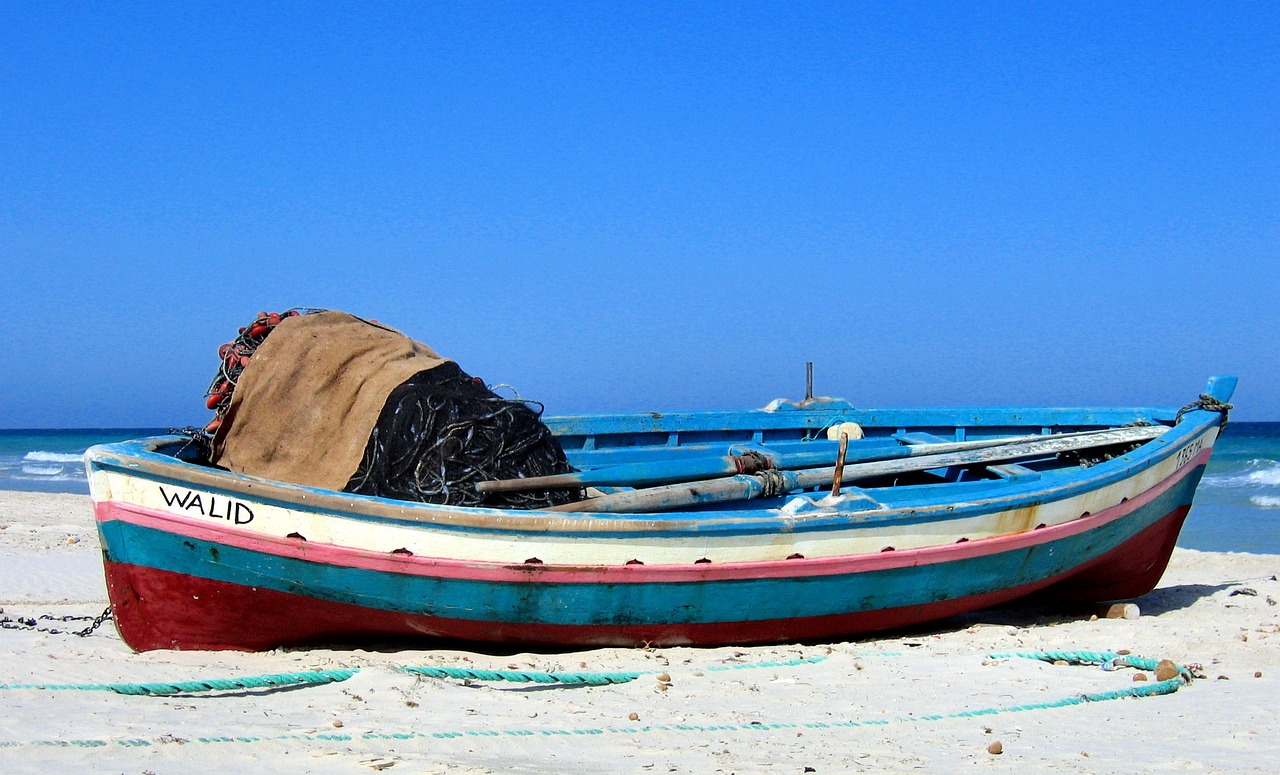 boat sea beach free photo