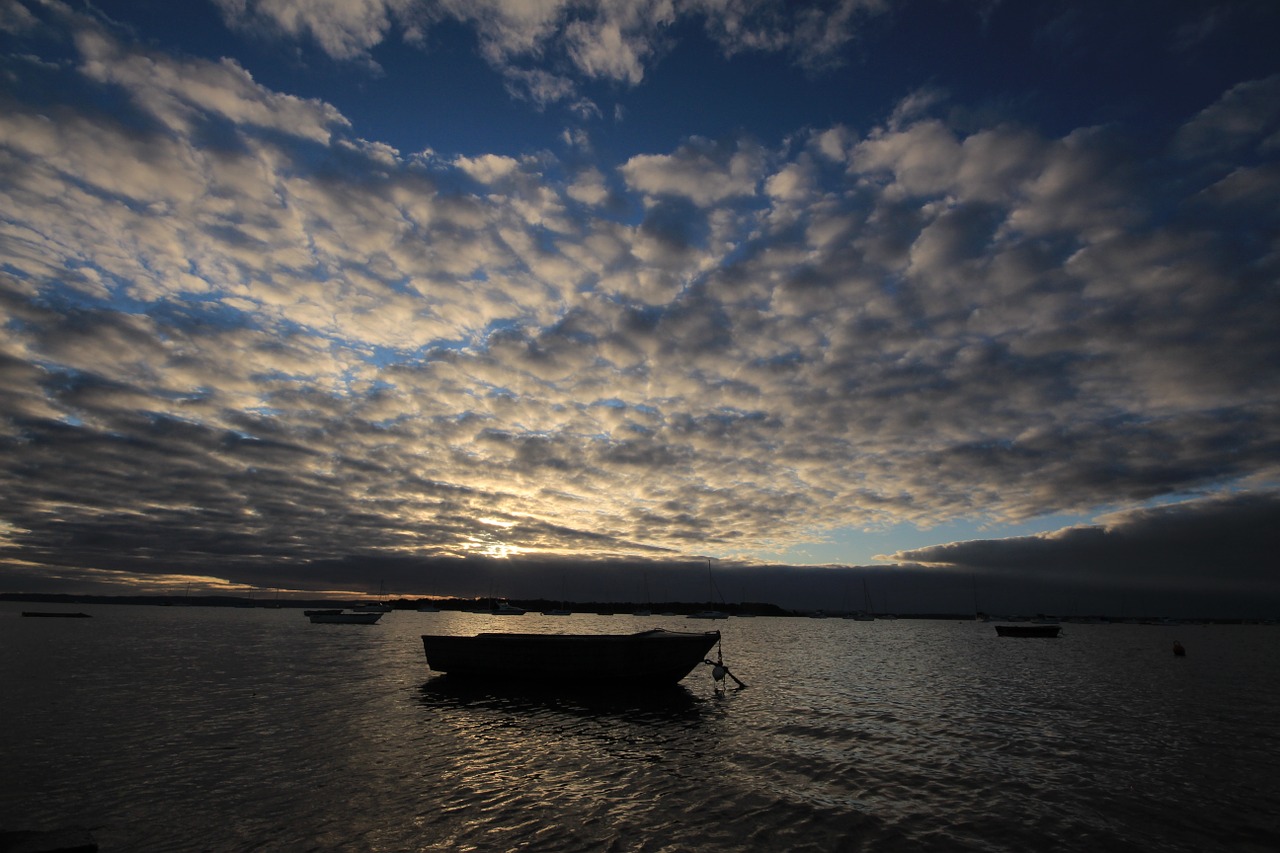 boat sunrise water free photo