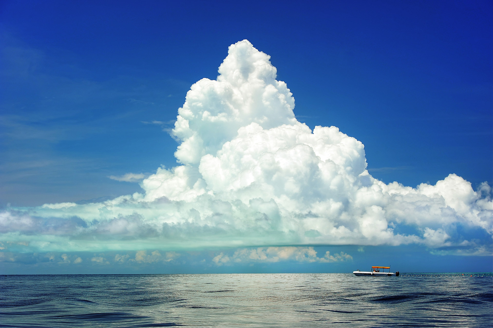 sea boat clouds free photo