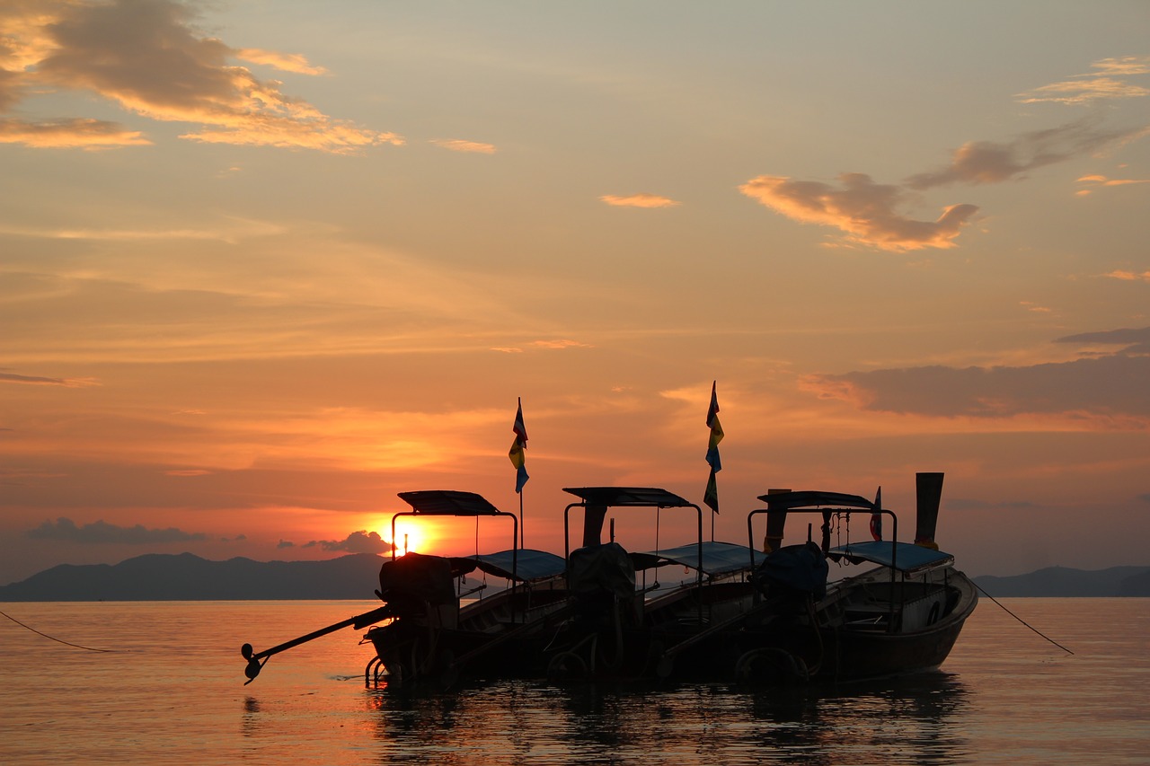 boats sunset lighting free photo