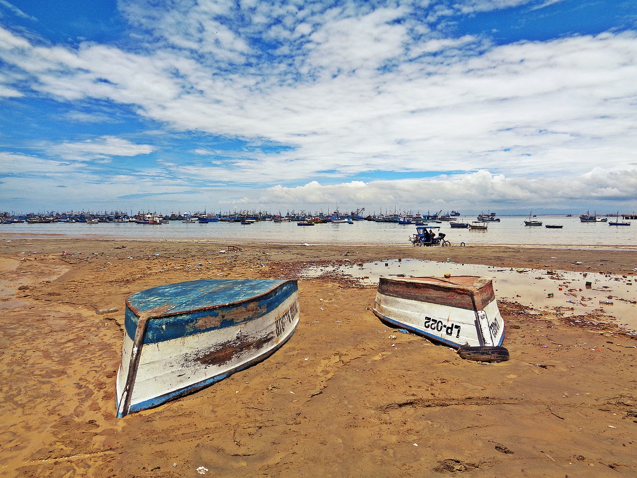 boats blue sky beach free photo