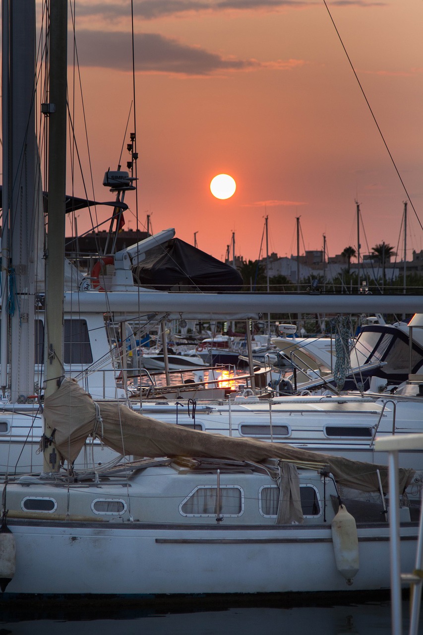 boats sunset water free photo