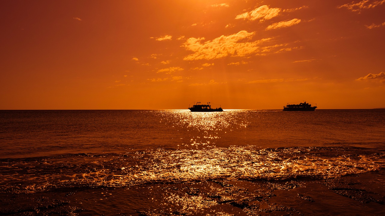 boats sunset sunlight free photo