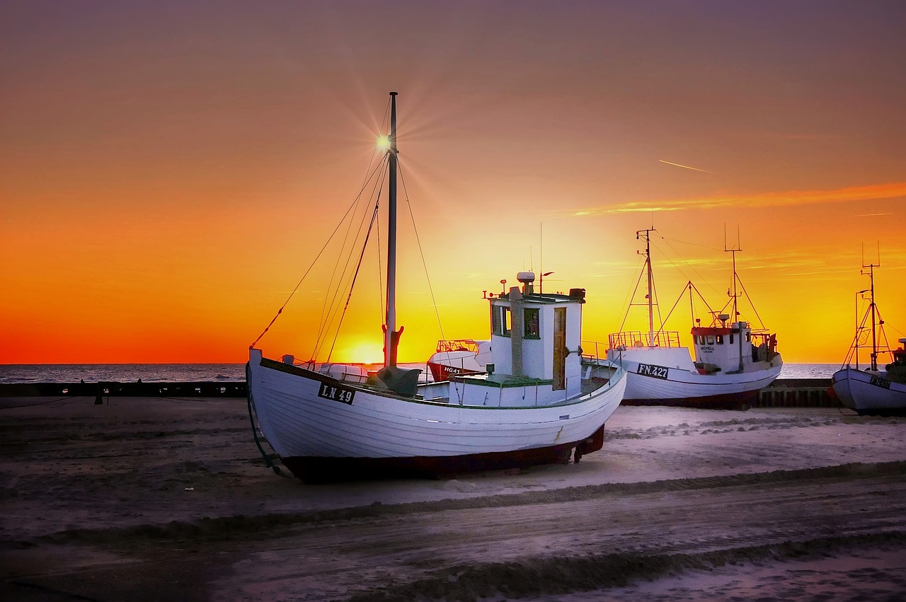 boats  sunset  sea free photo