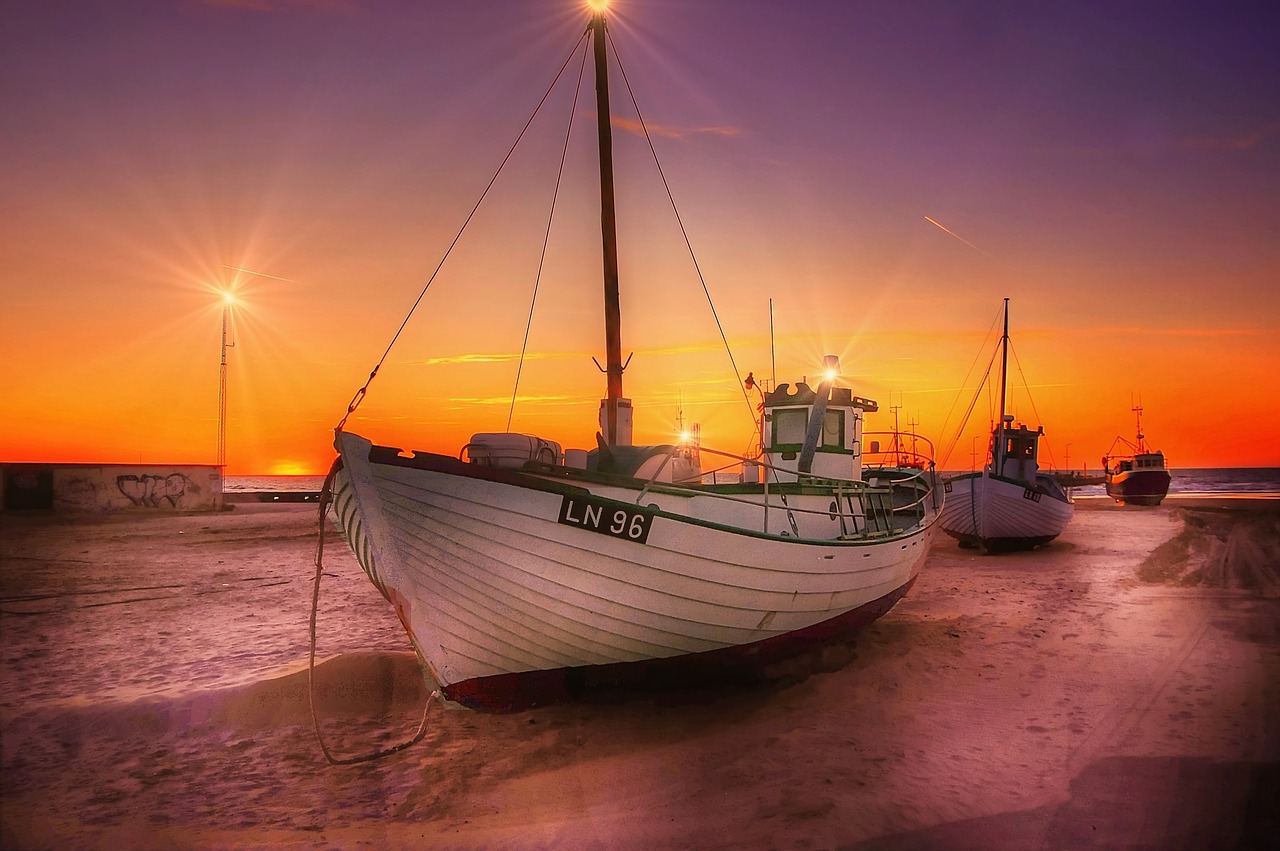 boats  sunset  sea free photo