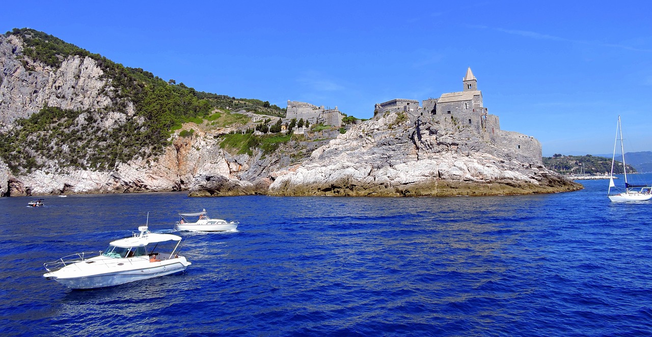 boats cliff sea free photo