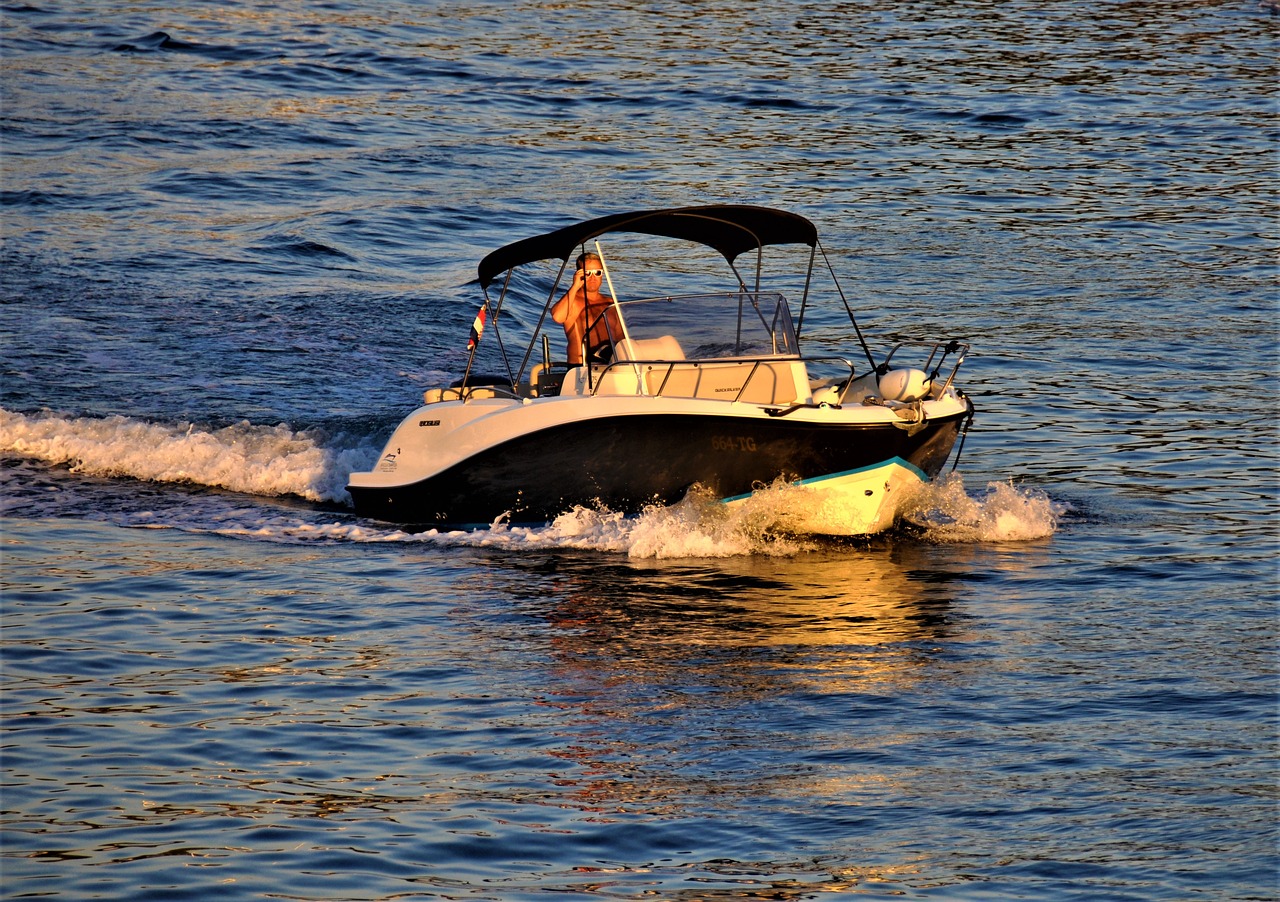 body of water sea boat free photo