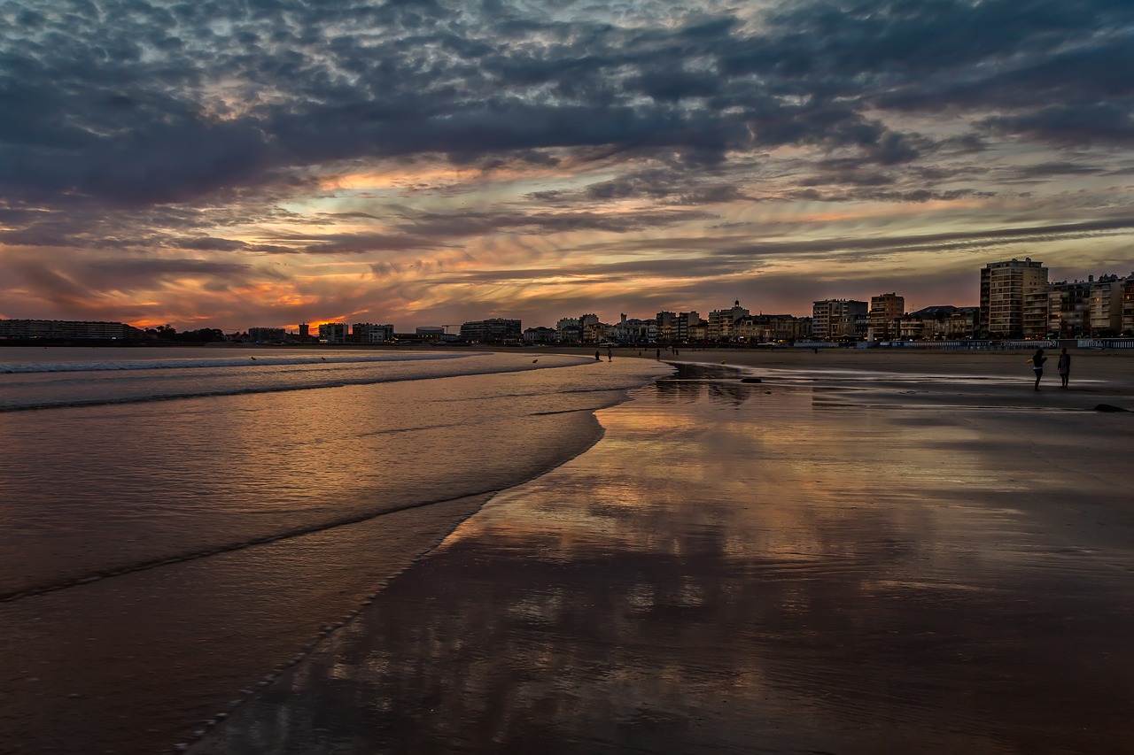 body of water sunset twilight free photo