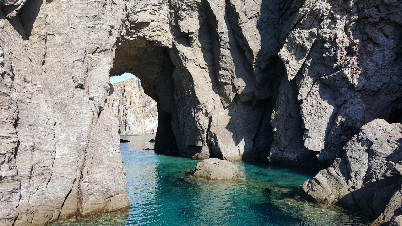 body of water nature cave free photo