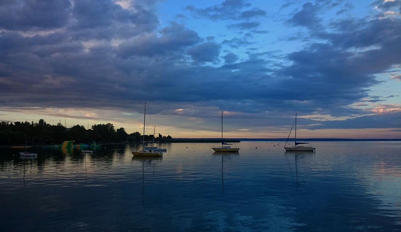 body of water heaven sunset free photo