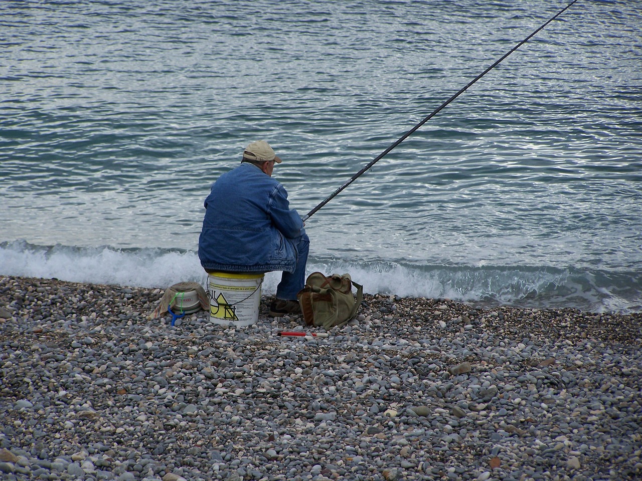 body of water  fisherman  rod free photo