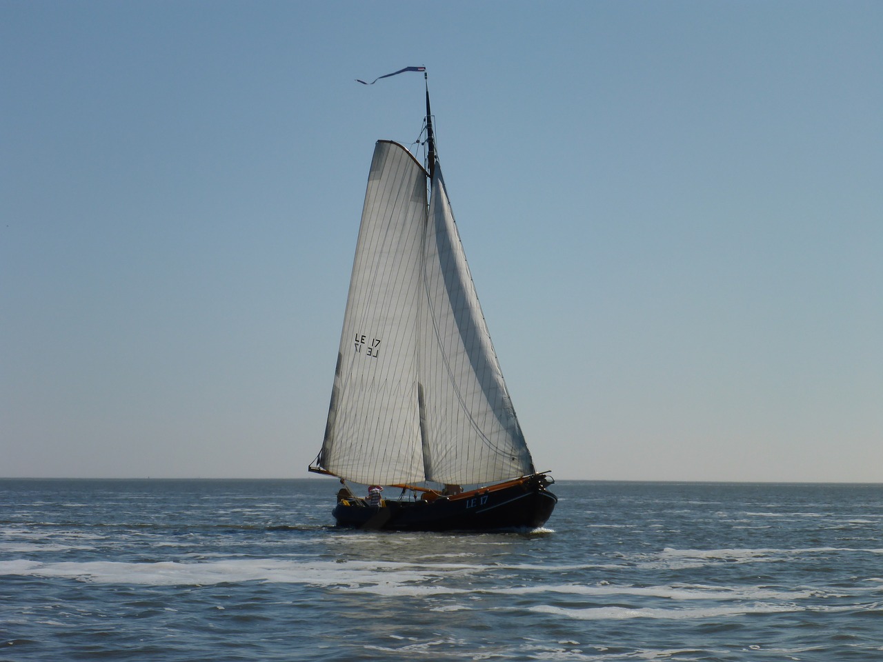 body of water  sea  sailing boat free photo