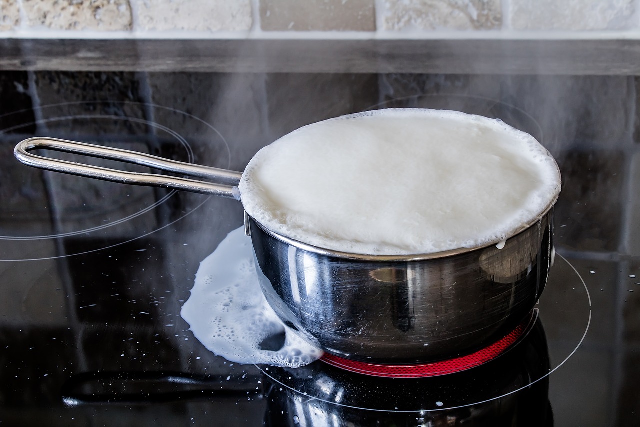 boiling over of milk ceramic hob hotplate free photo